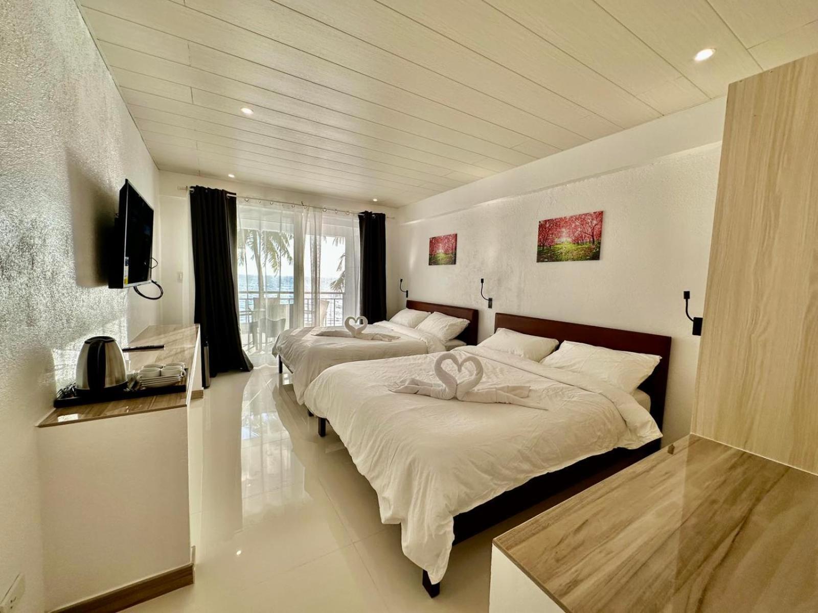 Calypso Beach And Dive Resort Manoc-Manoc Eksteriør billede